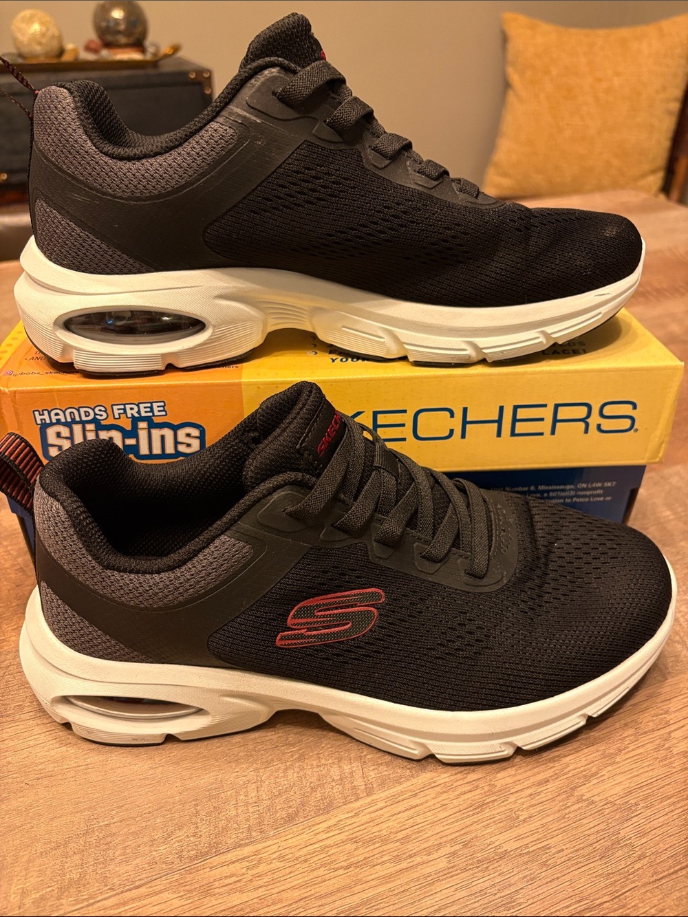 Skechers Men's Black Sneakers with White Sole and Red Logo